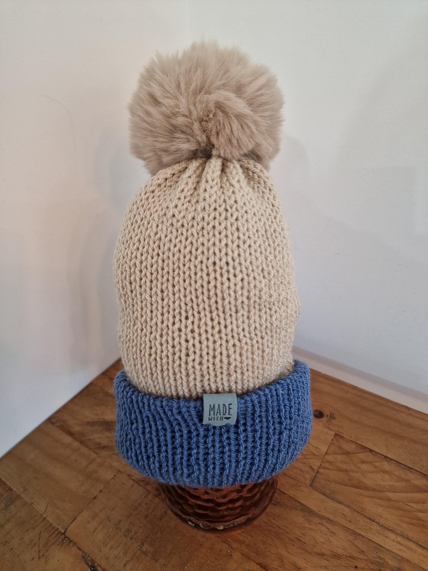 Handmade Light Beige Knitted Bobble Hat with Medium Blue Brim - Image 3